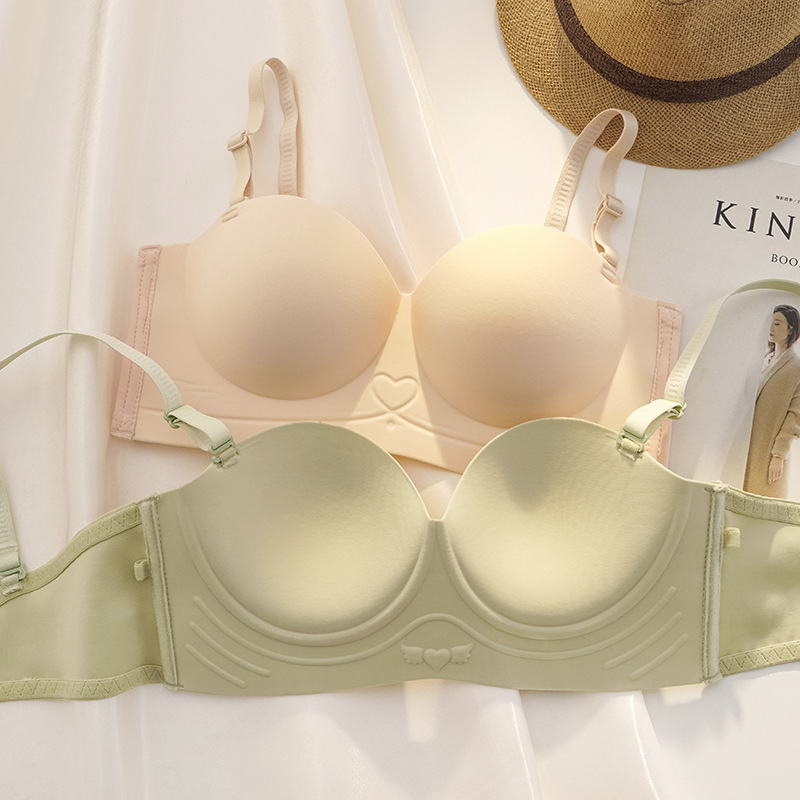 La media taza de la ropa interior de las mujeres pequeño cofre cómodo empuja hacia arriba grande sin anillo de acero pecho sujetador sin costuras de la piel