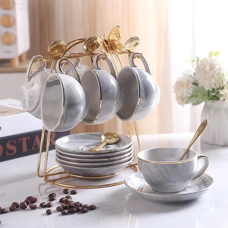 Luz de lujo taza de café traje de estilo europeo de alta apariencia taza y platillo taza de café de cerámica de alta gama exquisito juego de té de la tarde británica