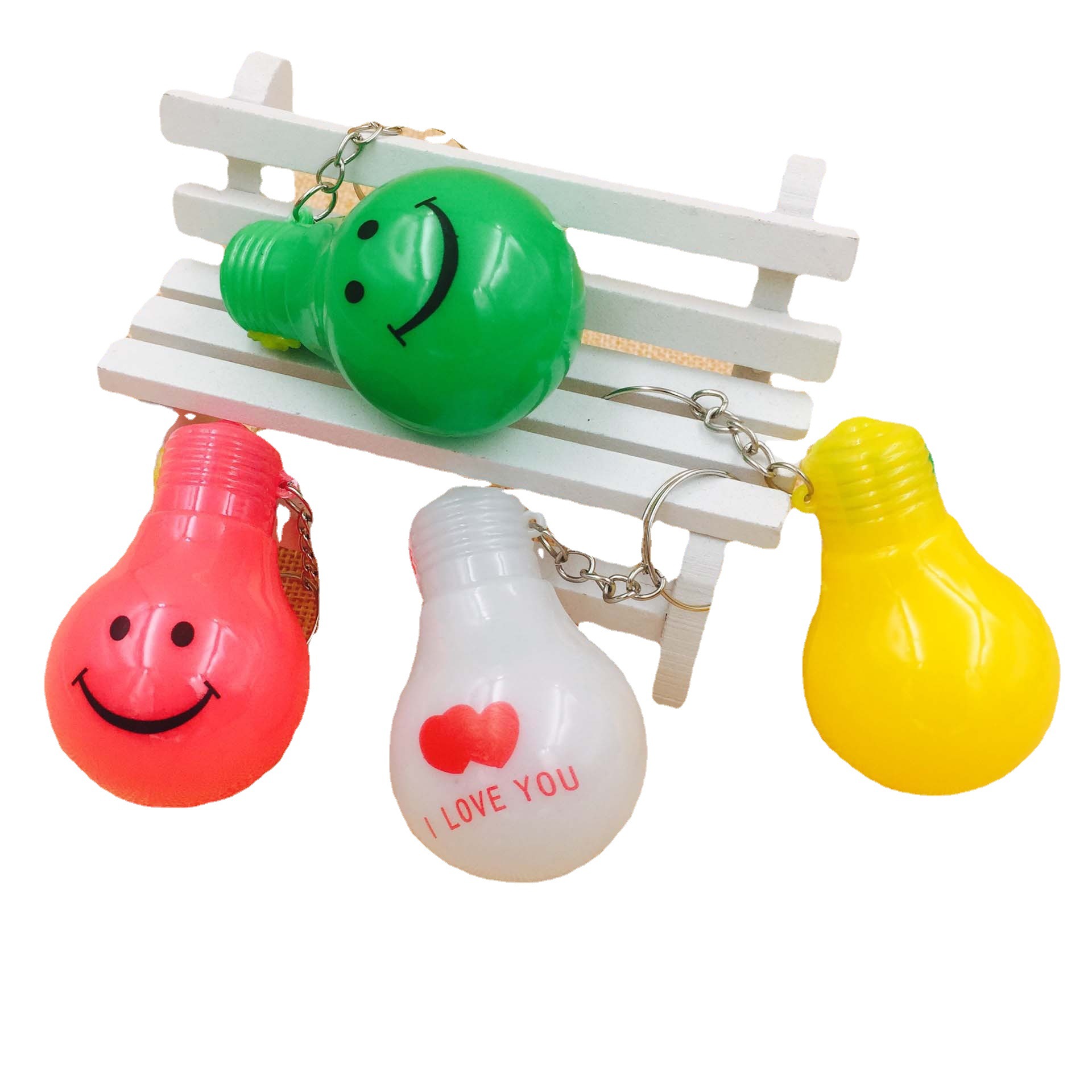Smiley bombilla flash de luz de color LED llavero creativo colgante de dibujos animados pequeño regalo puesto de suministro para imprimir OGO
