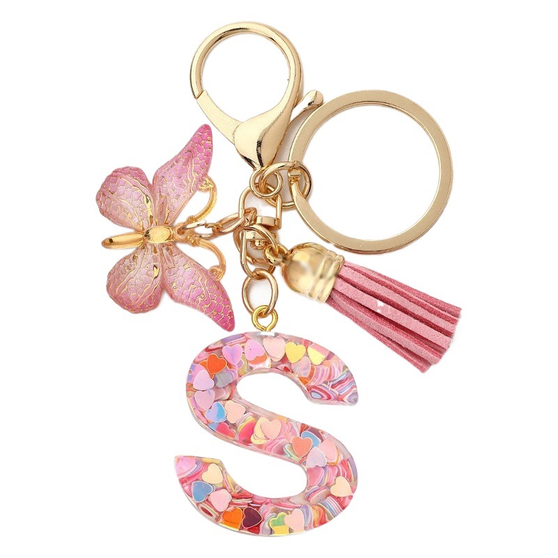 En stock transfronterizo resina letras inglesas epoxi joyería europea y americana popular mariposa adornos amor lentejuelas llavero