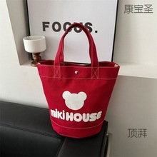 日系新款帆布包印刷卡通字母手提水桶包大容量饭盒包上班族背包