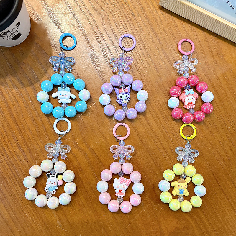 Creativa nueva muñeca pequeña cadena de teléfono móvil llavero colgante bolso lindo accesorios llavero de coche regalo al por mayor