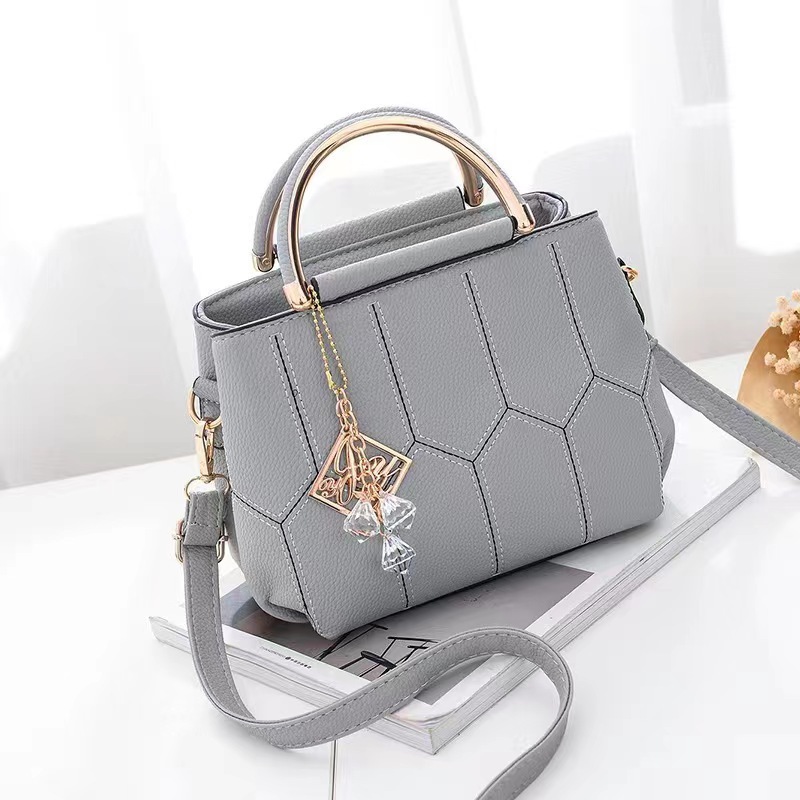 Bolso bandolera transfronterizo, bolso de mano pequeño, nuevo estilo moderno, bolso simple, bolso de hombro con bordado de hilo, bolso compacto.