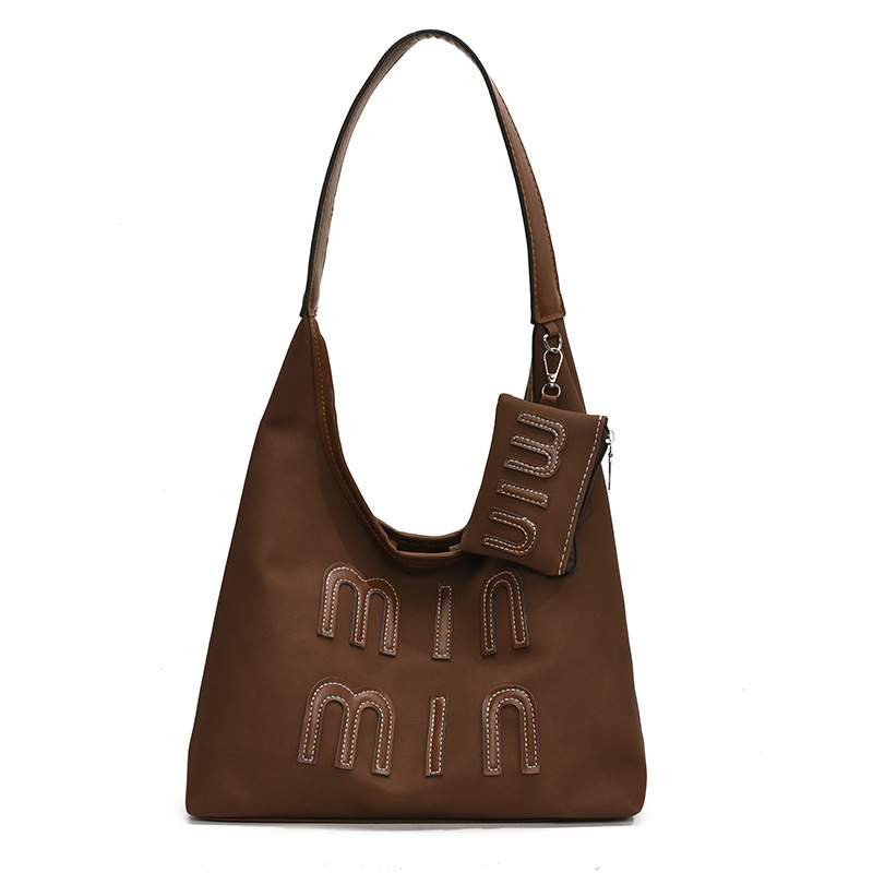 Bolso de moda de invierno de gran capacidad para mujeres 2024, nuevo nicho de diseño, bolso de hombro para estudiantes universitarios