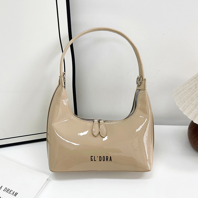 Bolsa de pan lacada brillante para mujeres 2025 nuevo diseño de letras bolso de moda de viaje bolso de mano bolso de hombro brazo