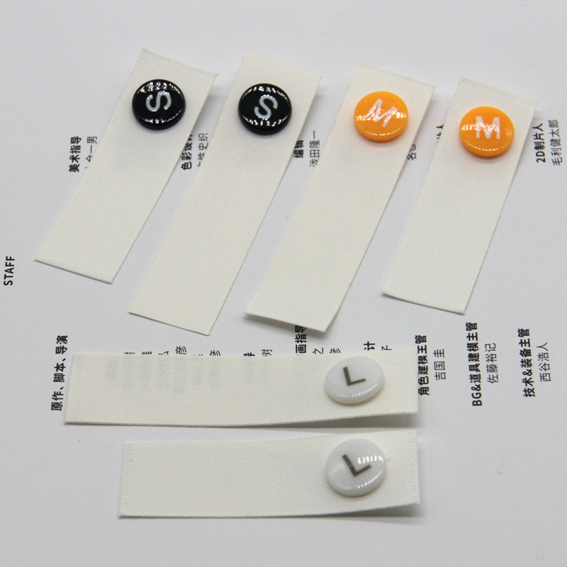 尺码扣圆形尺码标尺码粒分码按扣塑料二合扣服装消光带布标水洗唛