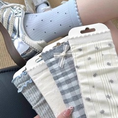 骨のない靴下の子供の波のポイントの山の靴下の春夏の薄い金の百合のネットの赤い韓国版のかわいい蝶結びの中の筒の靴下