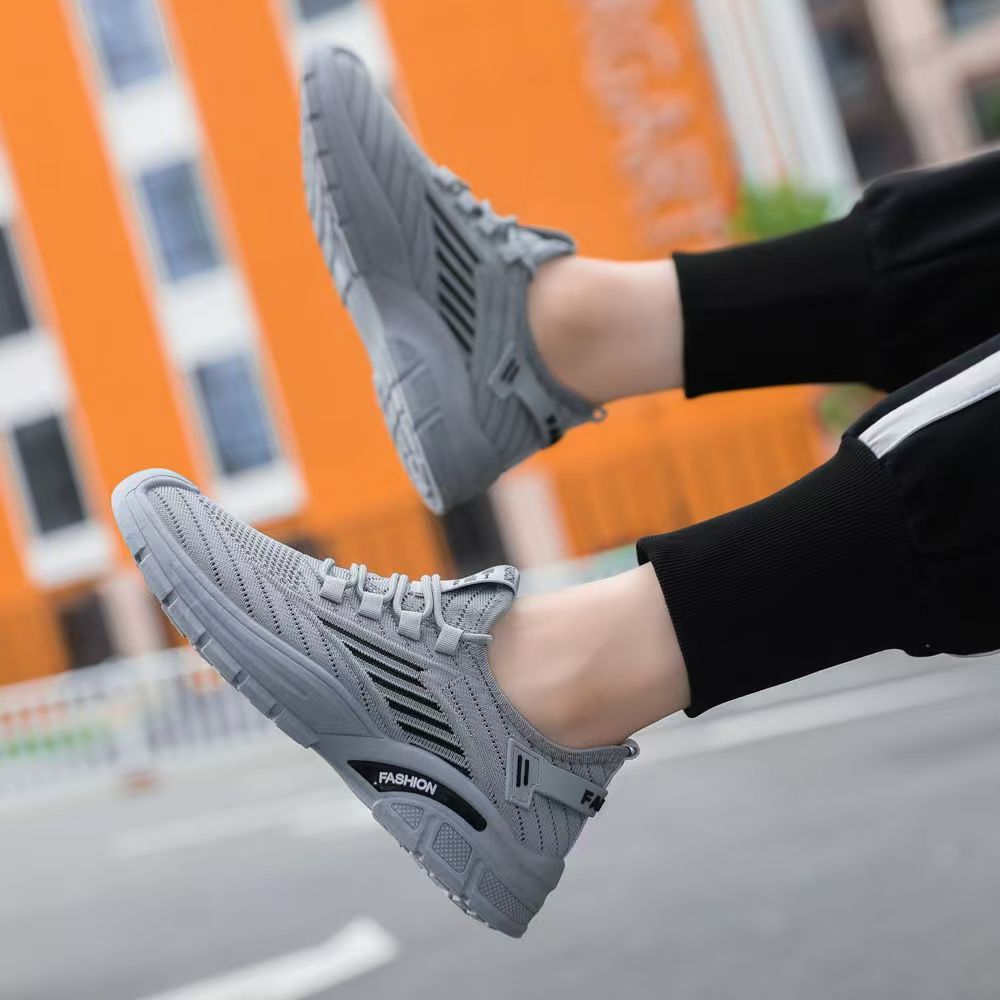 Zapatos de hombre de tejido volador de otoño simples y cómodos, zapatos casuales transpirables, suela gruesa aumentada, zapatos deportivos ligeros de bajo nivel de comercio exterior al por mayor