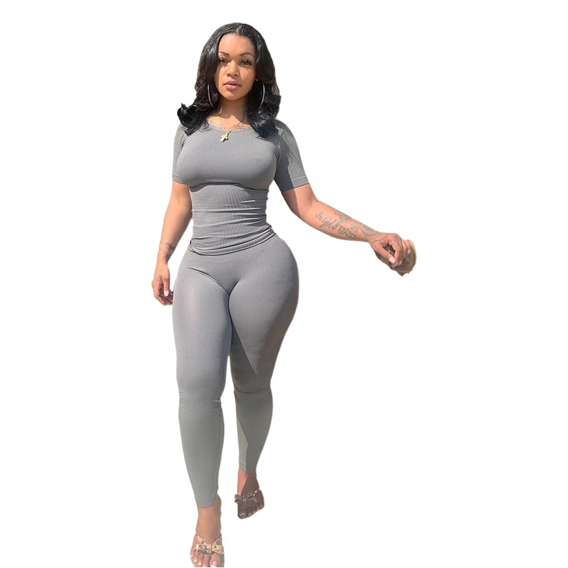 K9884 transfronterizo popular en stock Amazon europeo y americano más el tamaño de los deportes de dos piezas conjunto pit tira de alta elástica de color sólido traje de las mujeres