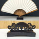 Black carved hollow fan holder