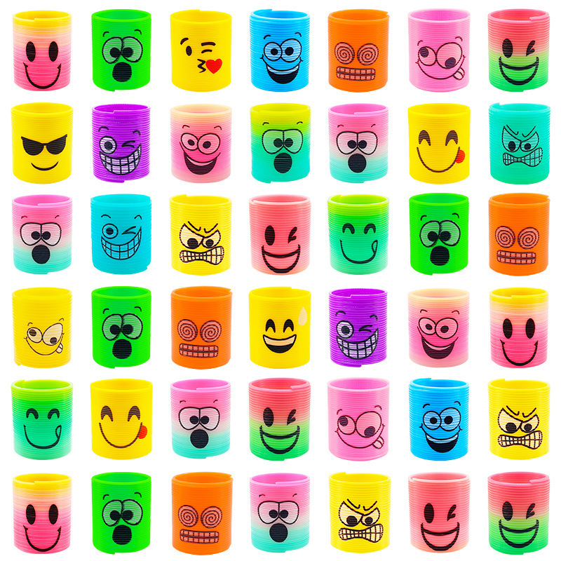 Regalo de trompeta de anillo de primavera de venta caliente transfronteriza, rompecabezas, nostalgia, sonrisas sonrientes apiladas, música mágica círculo del arco iris