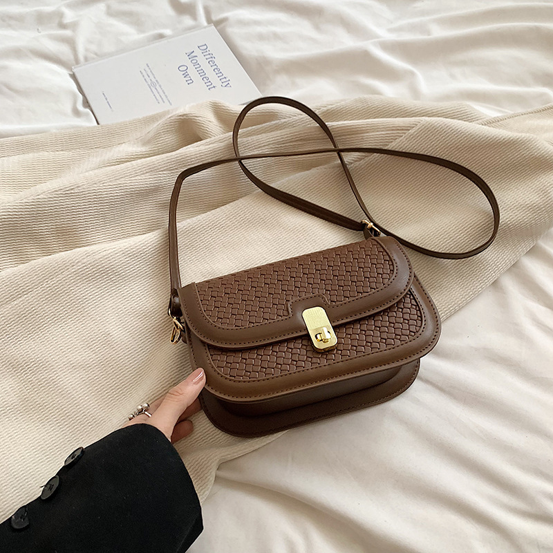 Diseño ligero de nicho de lujo tejido bolso cuadrado estilo extranjero estilo coreano universal de viaje diario de oficina mochila de hombro