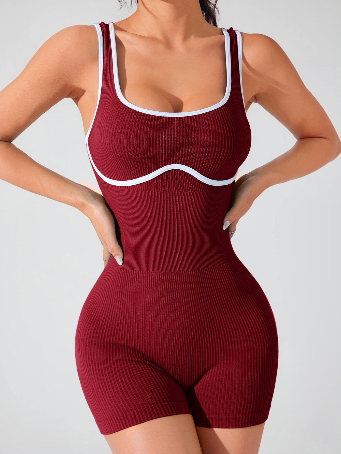 Ropa deportiva aérea con tirantes sin costuras de alta calidad, ropa de yoga de una pieza de color de contraste elástico, ropa de fitness de una pieza con espalda ajustada