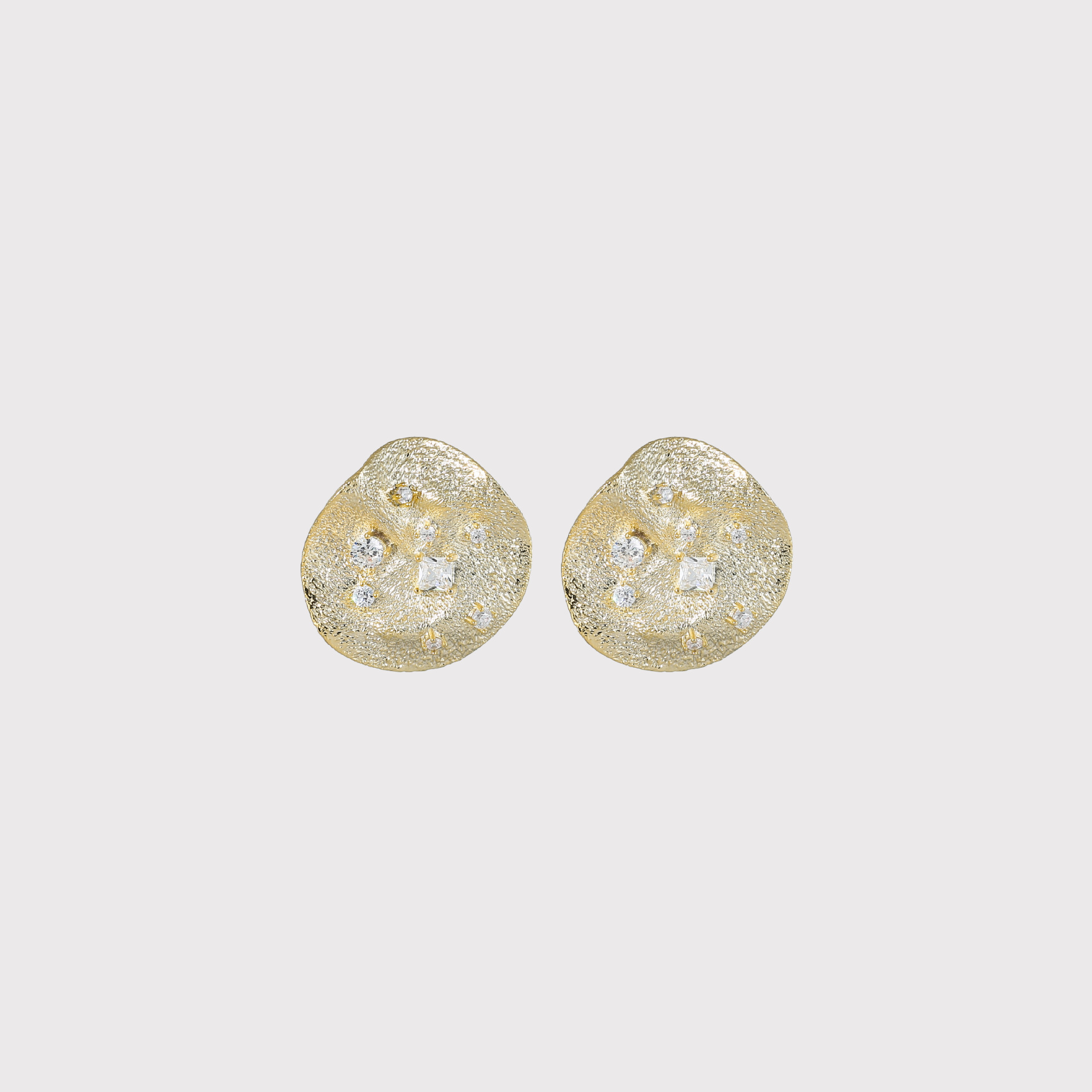 Rock-textured, round, and irregularly shaped earrings with cubic zirconia stones, a simple yet sophisticated design, and versatile for any outfit