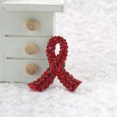 AIDS Awareness Day charity event red ribbon brooch, caring for women's health and breast cancer red ribbon flower