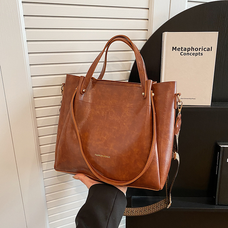 Borse da donna 2026 Nuovo modello Semplice Moda Borsa a tracolla grande capacità Vintage Tote_voghion.com