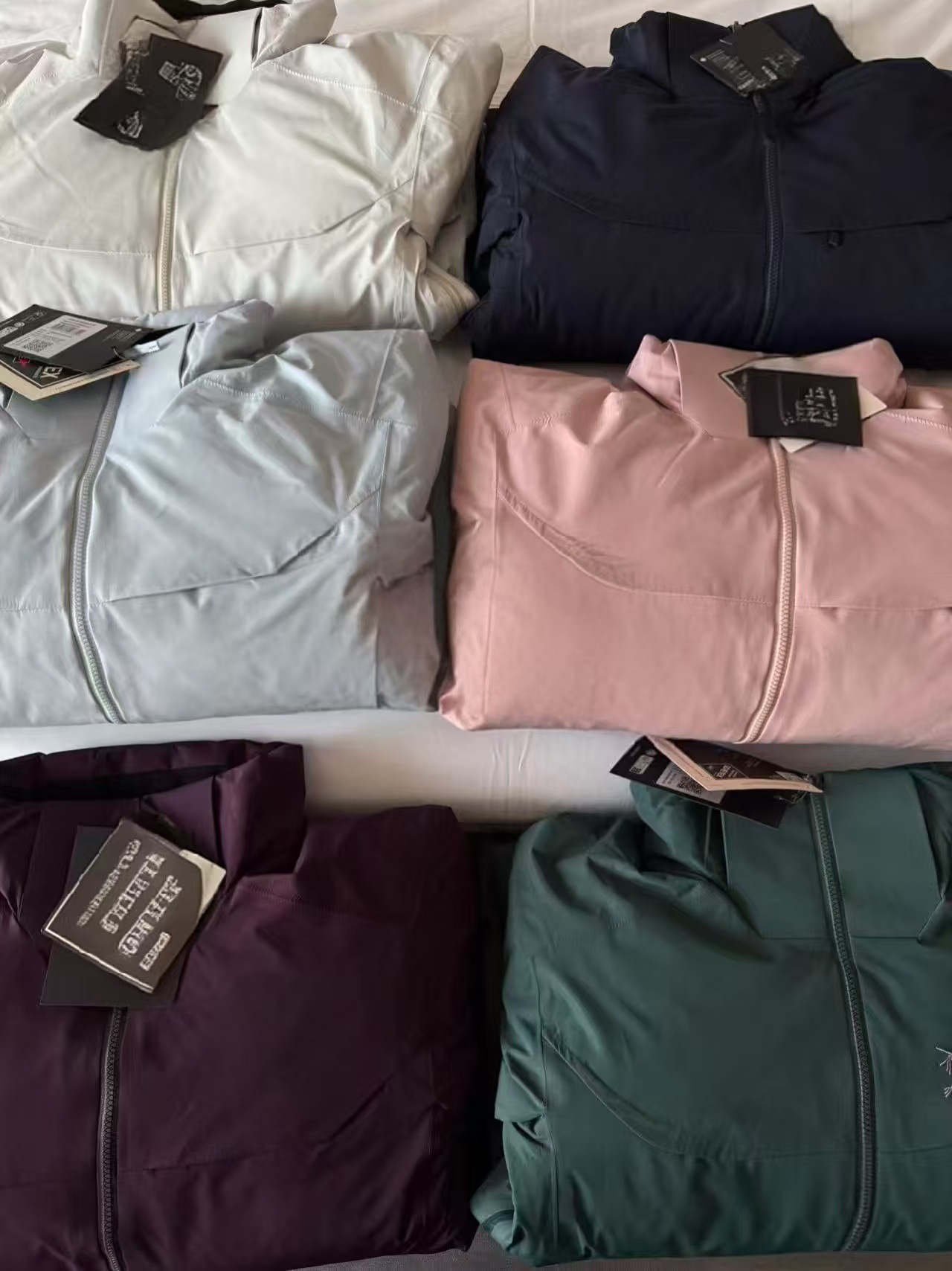 Bird 's Home Selection Grand Macai plumón chaqueta hombre y mujer impermeable a prueba de viento sombrero de montaña al aire libre desmontable explosión