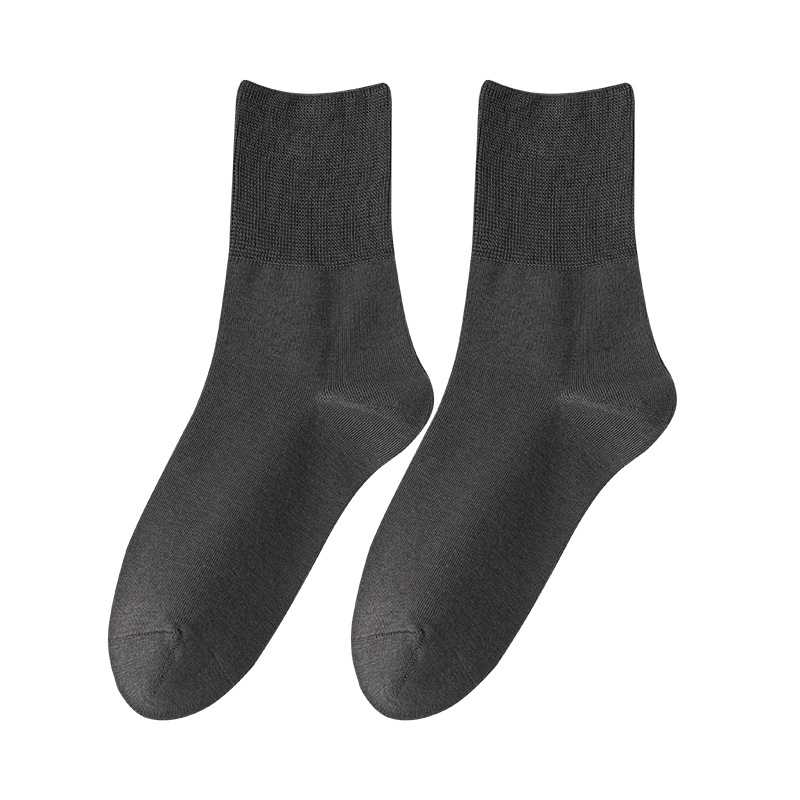 Calcetines de algodón de color sólido para hombres primavera, otoño y invierno en una máquina sin costura de hueso anti-balling embalaje independiente de calcetines de algodón