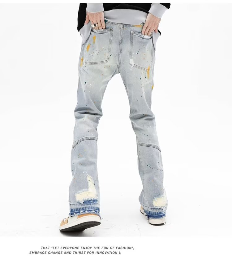 Jeans uomo slim fit stretch con strappi e taglio micro flare_voghion.com