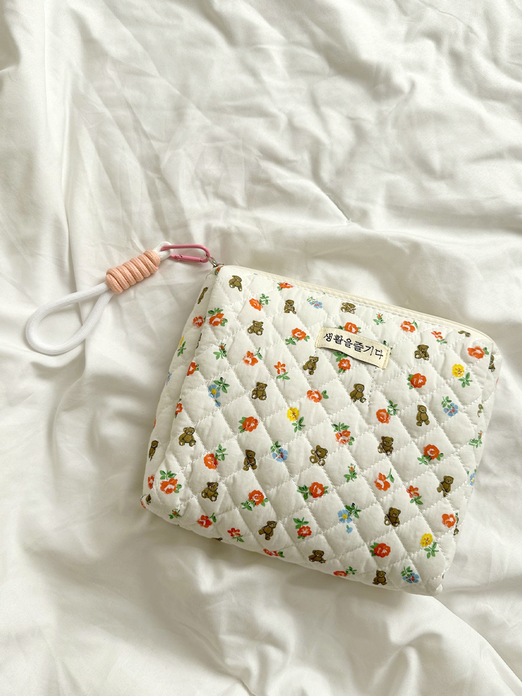 Corea del Sur flor oso acolchado bolsa de cosméticos hembra original lindo ilustración rompecabezas bolsa de lavado bolsa de almacenamiento de viaje portátil