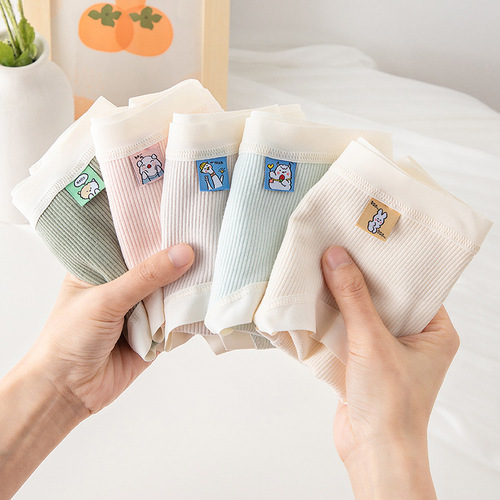 Simple solid color women's underwear girls cartoon cloth label shorts mid-waist breathable cotton crotch student briefs wholesale