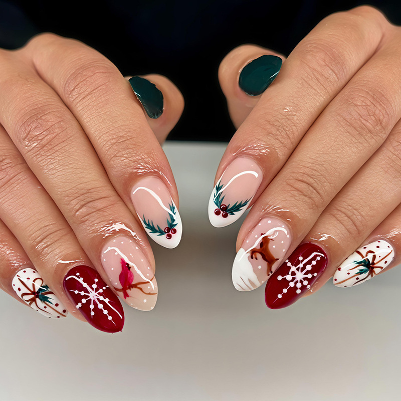 Cross-border winter Christmas press-on nails with reindeer, snowflakes, holly fruit, and bows Cross-border winter Christmas press-on nails with reindeer, snowflakes, holly fruit, and bows