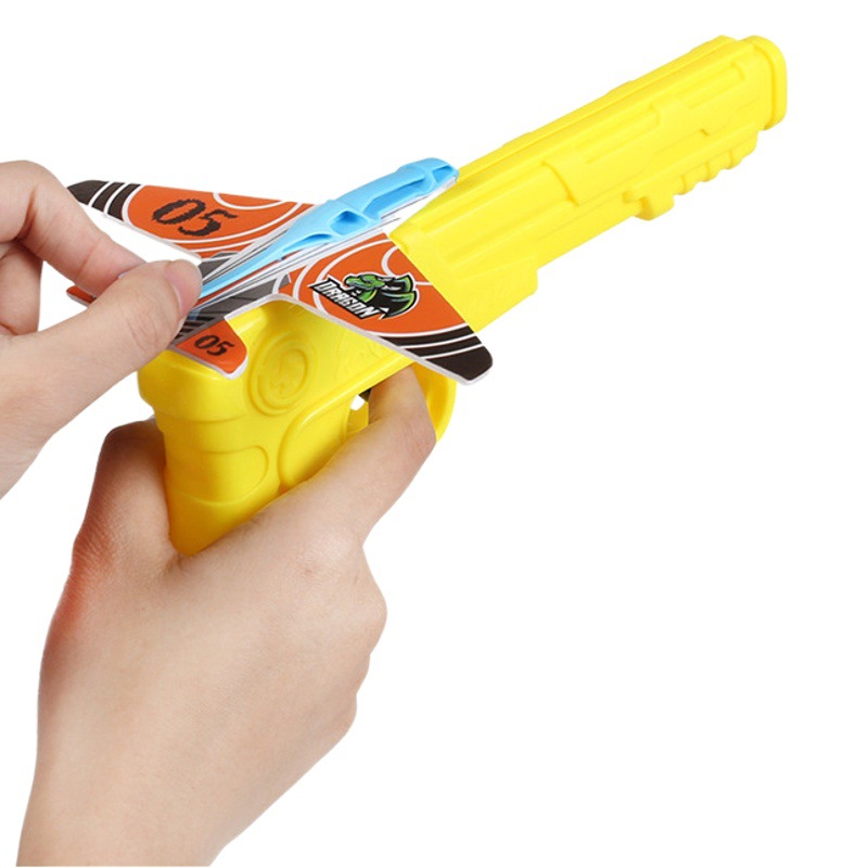 Catapulta de espuma para niños Aeronave pistola competitiva columpio espuma aviones al aire libre popular catapulta de un solo clic transmisor de deslizamiento