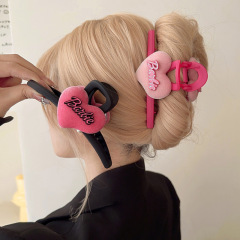 バービー粉耶甘いクールなぬいぐるみのヘアピンの女性の後頭部の高級感があります。