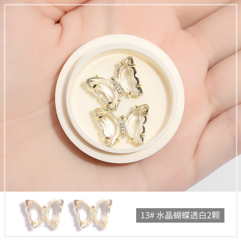 Online popular hielo transparente Aurora mariposa joyería cristal blanco piedra tridimensional uñas diamante Super Flash rhinestone uñas joyería