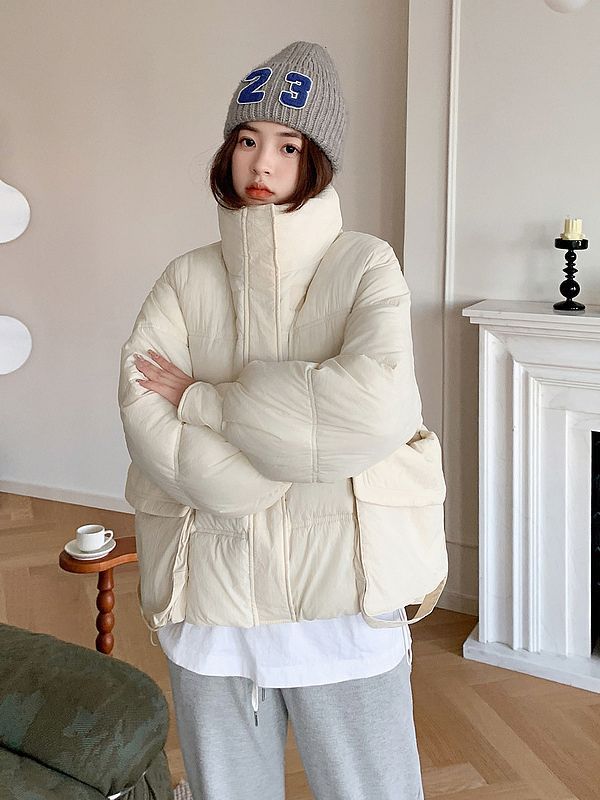 Ropa de pan de mujer corta ropa de algodón de tamaño grande 2023 otoño y invierno nueva chaqueta de algodón de bolsillo grande gruesa y suelta de moda de estudiantes