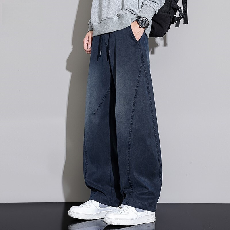 Spring and Autumn Spliced ​​Handsome Scimitar Jeans Men's Loose Straight American High Street Trendy Washed Casual Long Pants