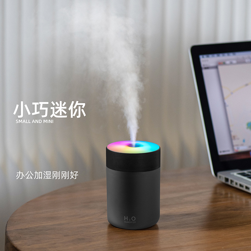 Transfronteriza nuevo colorido taza humidificador hogar niebla volumen colorido lámpara coche humidificador pequeño portátil
