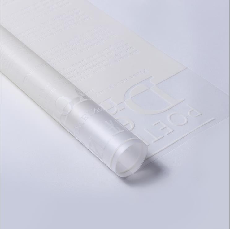 Fabricante de fiestas de flores al por mayor nuevo patrón de amor de San Valentín papel de embalaje de flores floristería translúcida ramo de flores