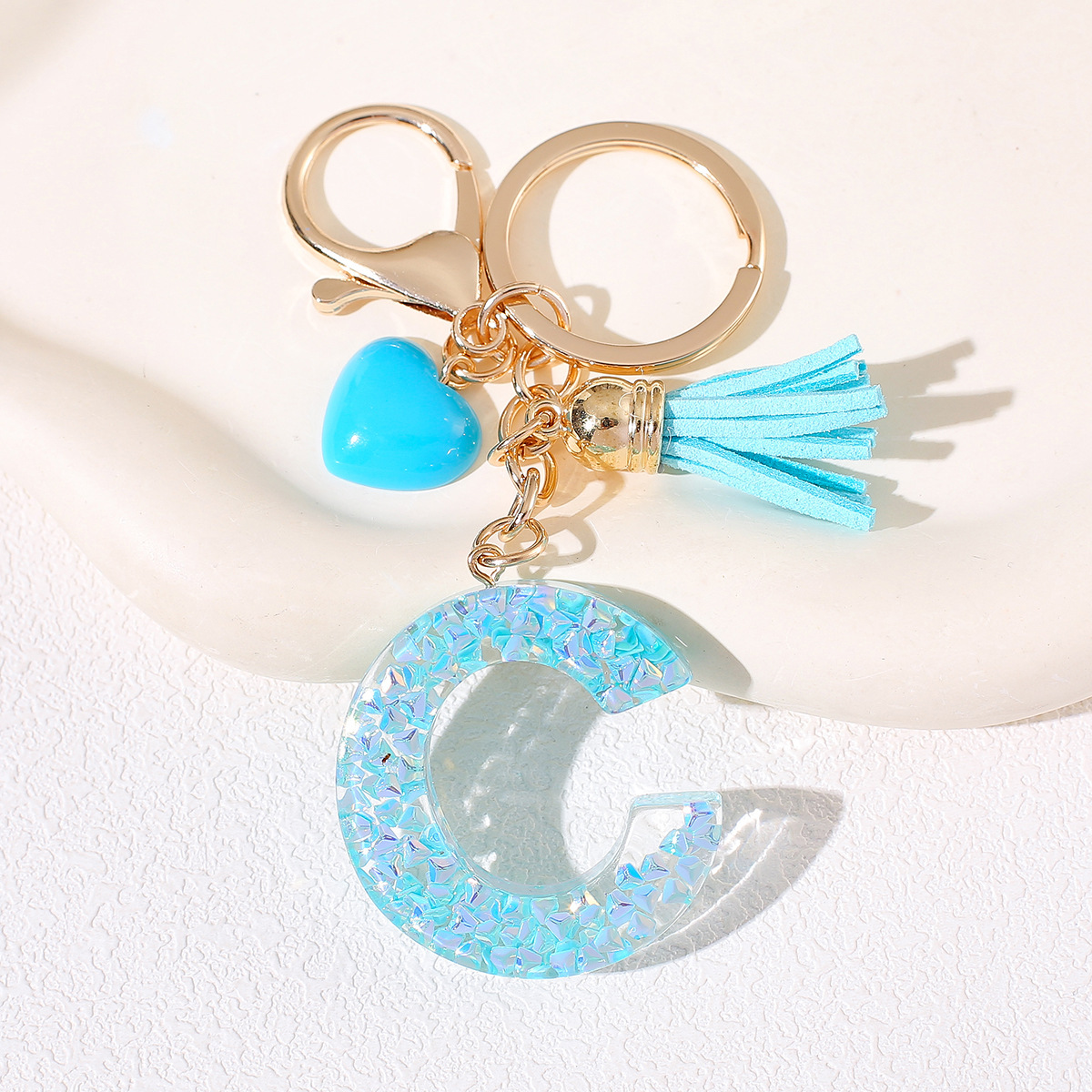 Nuevos productos azules de amor con frascos de letras lindos enclavadores decoraciones europeas y americanas populares llaveros damas