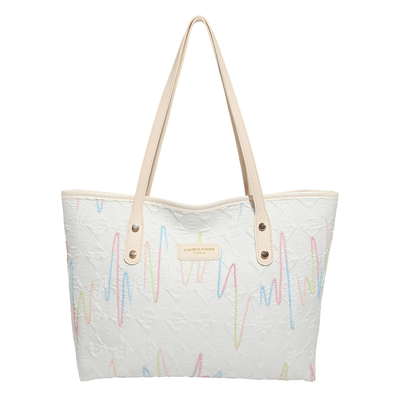 Bolsas de tela de clase de estudiantes para mujeres 2025 nuevo hombro brazalete estriado de gran capacidad de viaje ocio bolsa de mano