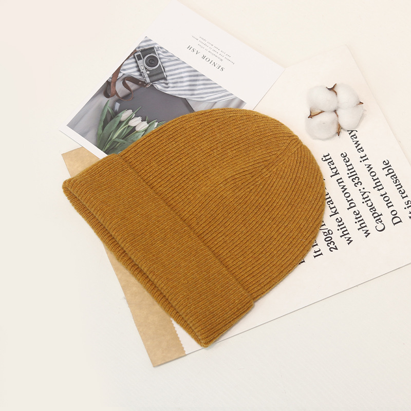 Estilo coreano de moda todo fósforo de color sólido sombrero de punto de una sola capa cómodo sombrero de lana suave y rizado otoño e invierno hombres y mujeres mismo cálido