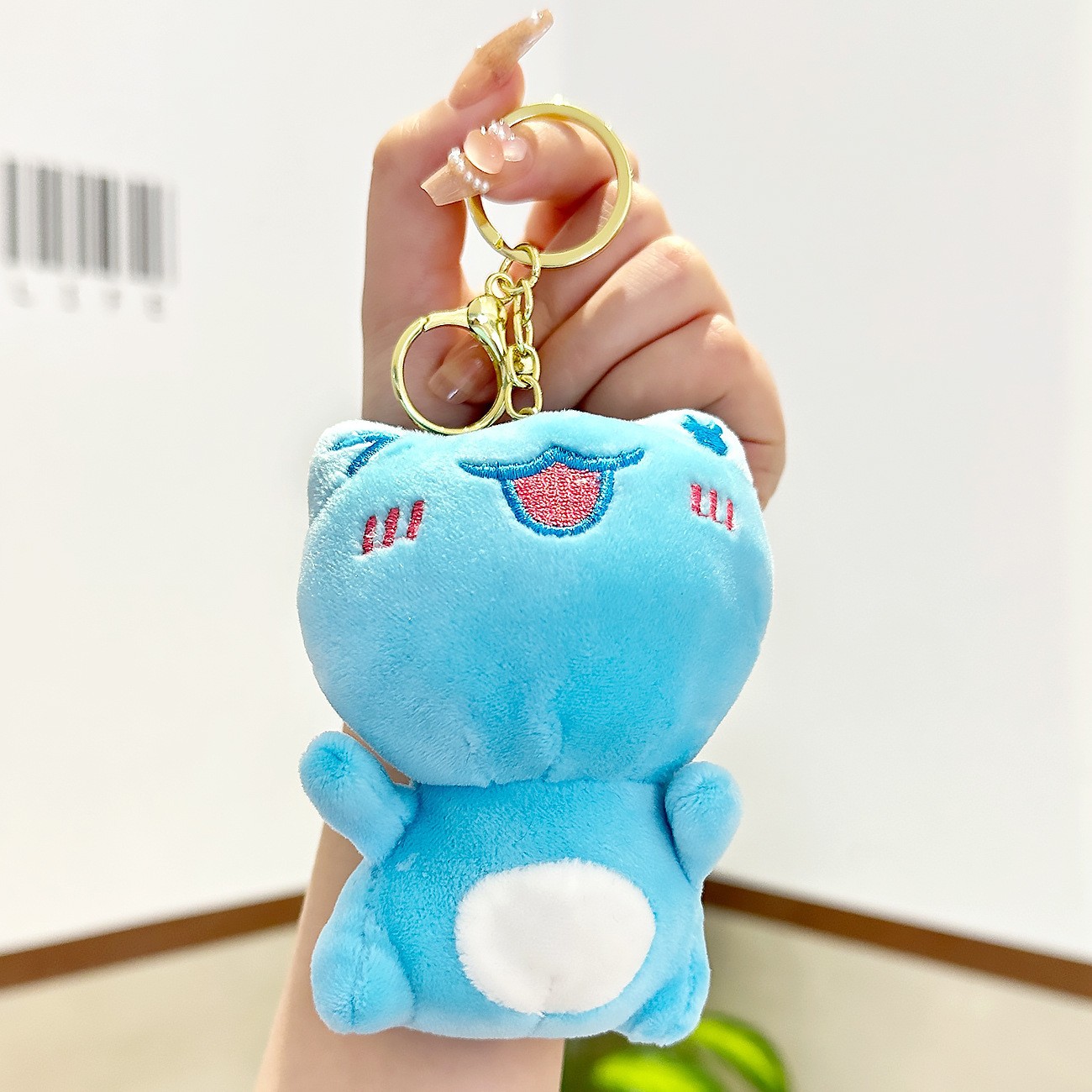 Cuatro pulgadas muñeca máquina colgante felpa llavero lindo muñeca mochila adornos grab máquina muñeca regalo al por mayor