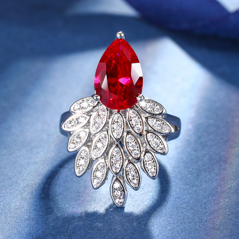 2024 nuevo estilo Zhuang Sheng joyería cobre inferior chapado en oro moda simulación color tesoro corindón temperamento colgante traje femenino 8*12