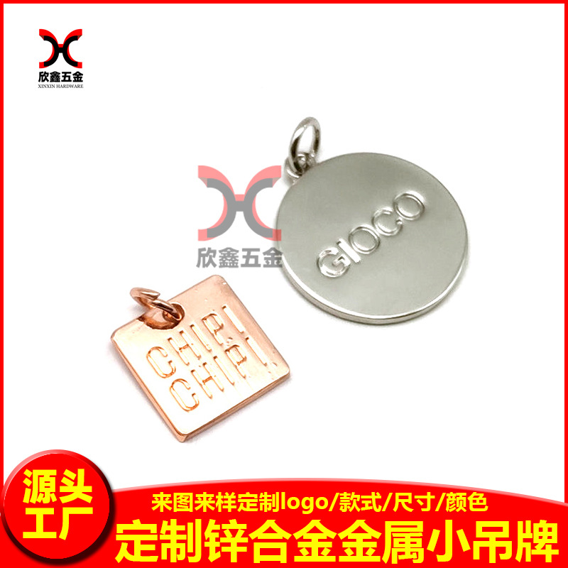 泳衣金属小吊牌刻字压铸电镀比基尼合金字母logo椭圆形标镍色批发