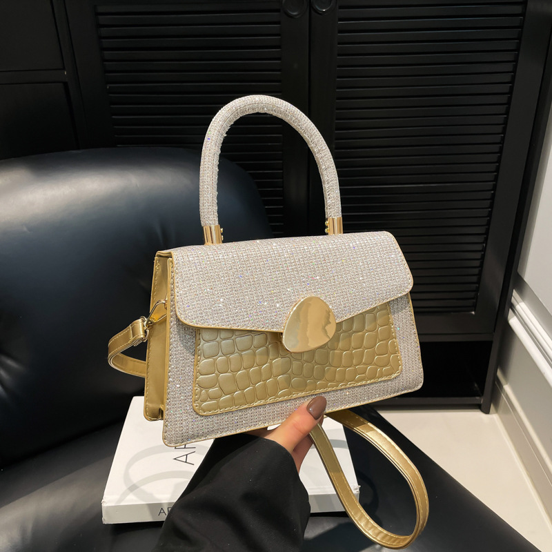 Hong Kong retro caramelo bolso de mujer 2025 moda nueva mochila de moda estilo extranjero cocodrilo empalme bolso pequeño