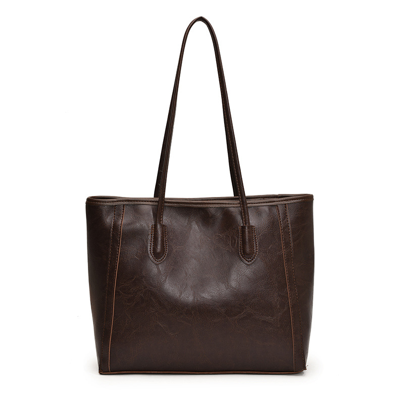 Bagos de textura de transporte aéreo 2024 otoño y invierno nuevo estilo coreano de moda bolso de hombro axilar temperamento bolso especial