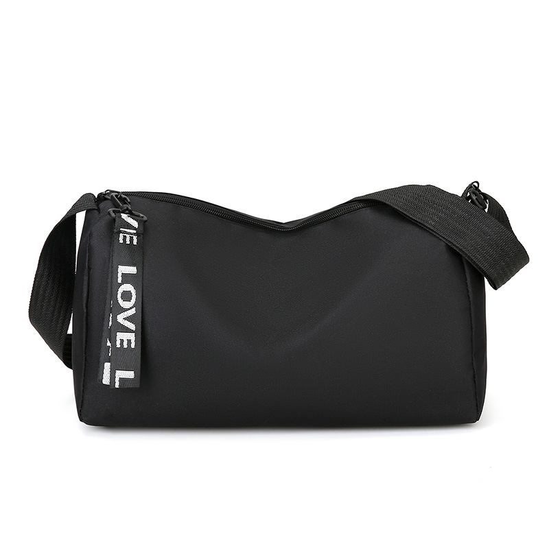 Comercio exterior nuevo tipo de bolso de hombre moda coreana bolso cilíndrico de nylon para salir simple viaje universal bolso de hombro