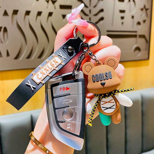 Genuine creative cartoon strap bear doll pendant car keychain school bag pendant couple exquisite small gifts wholesale