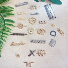 帽子合金配件渔夫帽插脚饰品配件字母标现货手缝金属吊牌商标