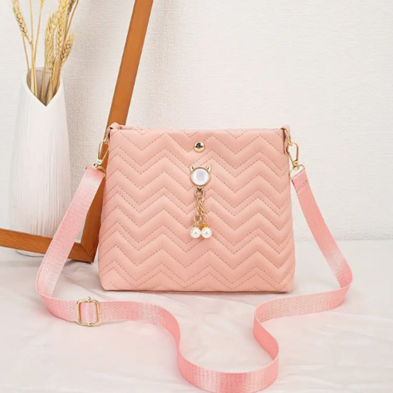 Moda coreana ondulada estriada felina colgante de perlas decoración simple bolsa de mujer mochila al por mayor bolsa image 8