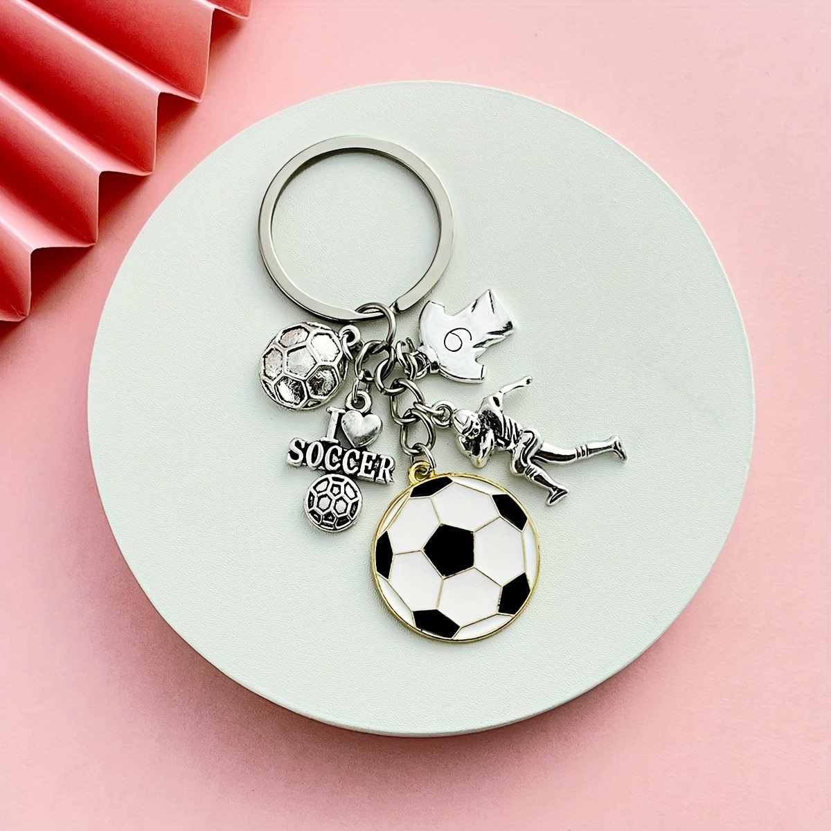 Serie de oro de aleación de venta transfronteriza caliente fútbol béisbol rugby sombrero hechicero puño llavero colgante mochila