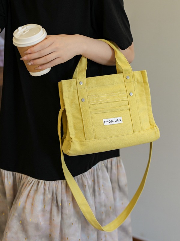 Transfronterizos directos de venta caliente de Amazon tela bolsa de mano para mujeres 2024 nuevo estilo de alta sensación de hombro mochila