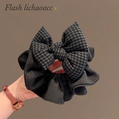 黒とグレーのチェック柄リボンヘアゴム韓国のハイエンドヘアアクセサリーヘッドバンド 2025 新しい質感生地腸リングヘアロープ女性のための