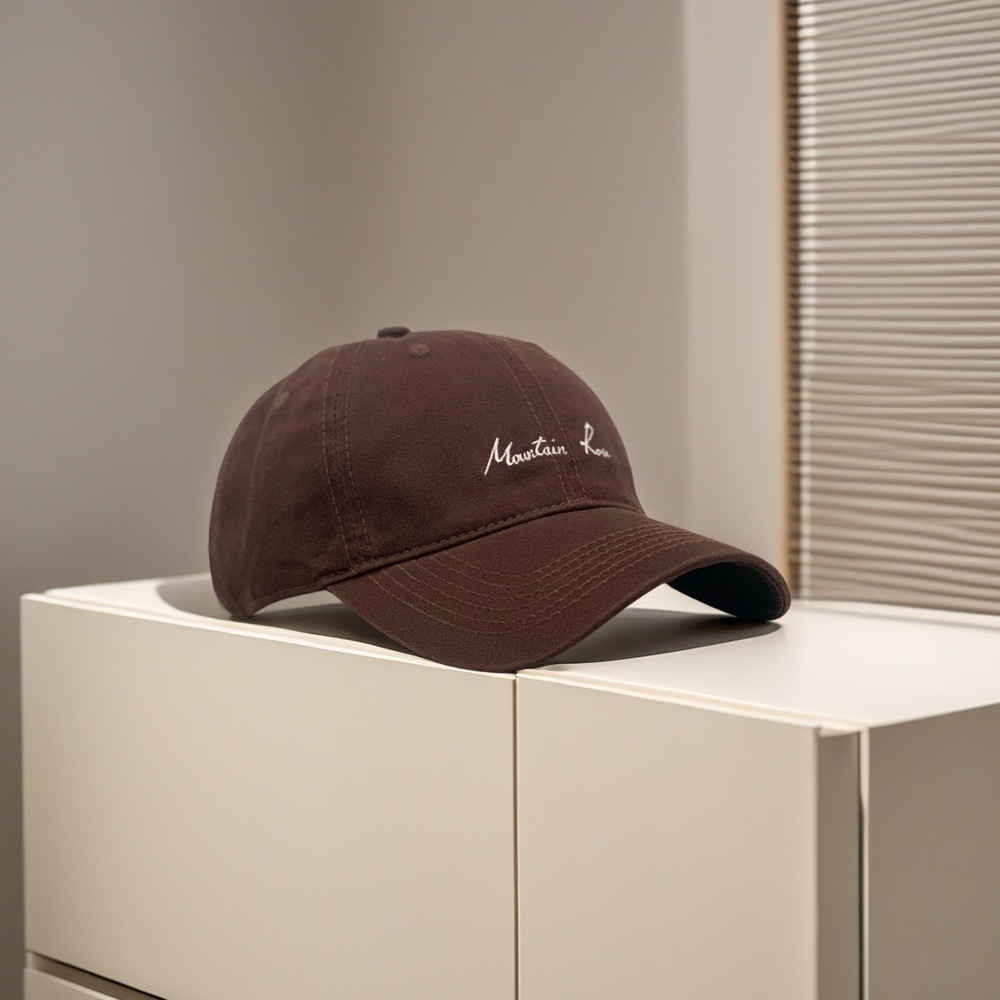 Sombrero de béisbol de estilo japonés original minimalista para hombres y mujeres ociosos con una cabeza grande para mostrar la cara con una gorra de lengua de pato protectora contra el sol.