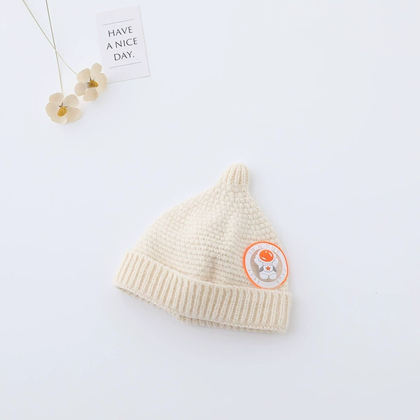 Round label pacifier hat